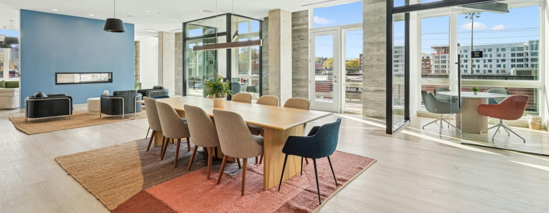 a large room with a table and chairs